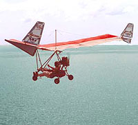 One of the Friesen brothers over the Pacific Ocean in a Right Flier